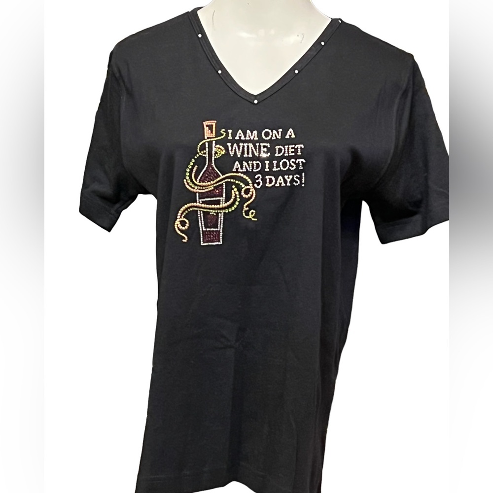 Fun and funny tee shirt! Saying says,” I am on a wine diet and I lost 3 days”.